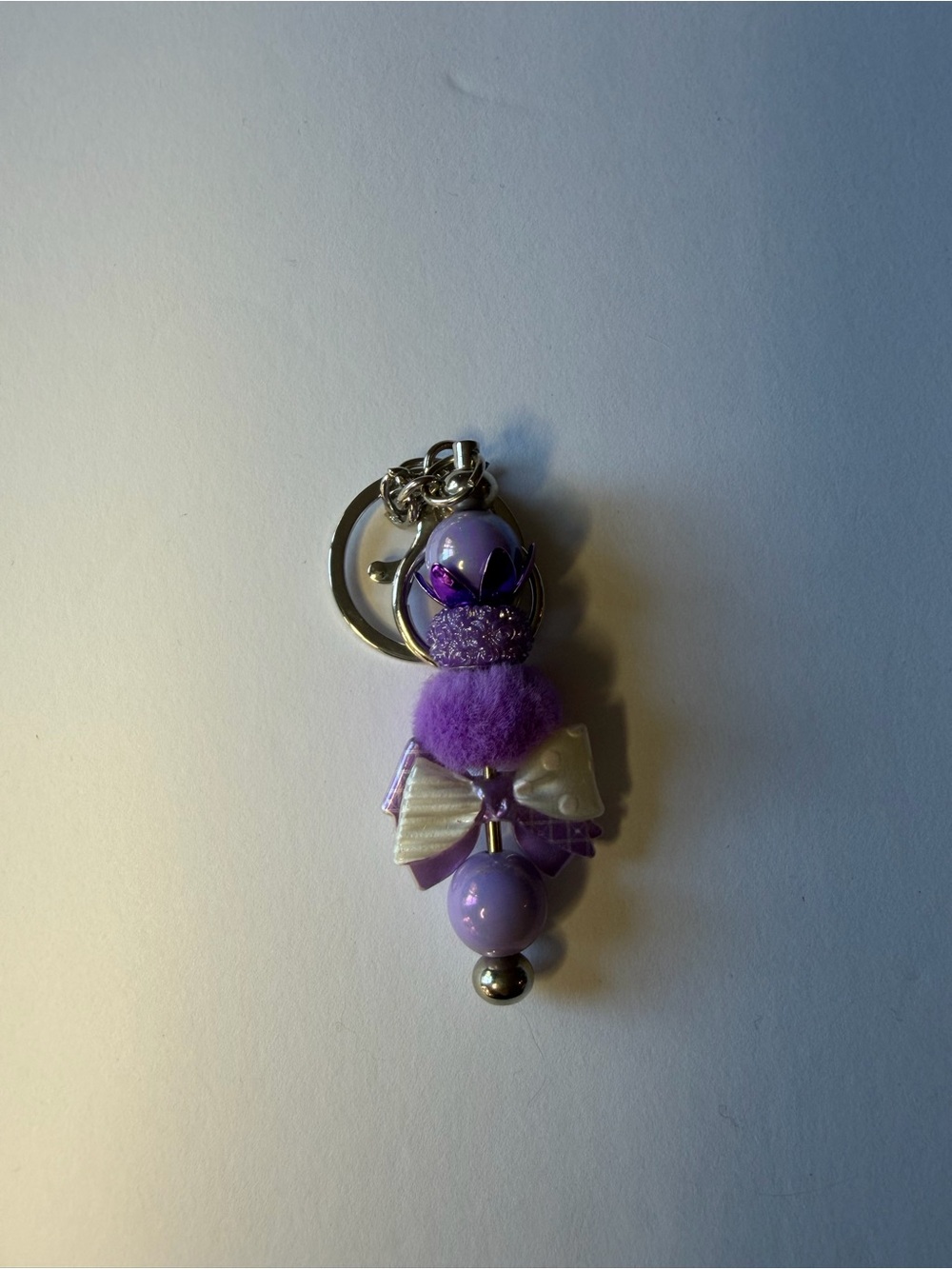 Purple Beaded Charm Keychain with Bow Accent